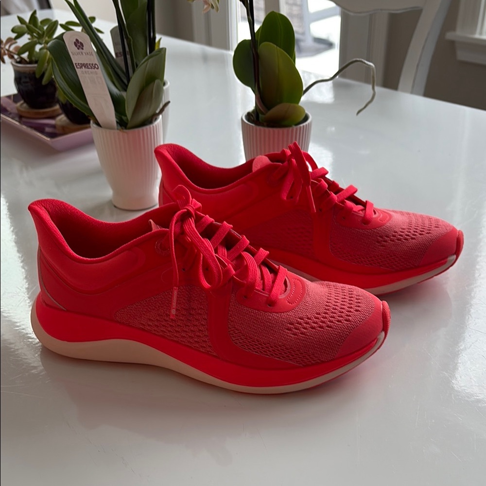 Like new Lululemon running shoes. Hyper coral pink, size 6.5M